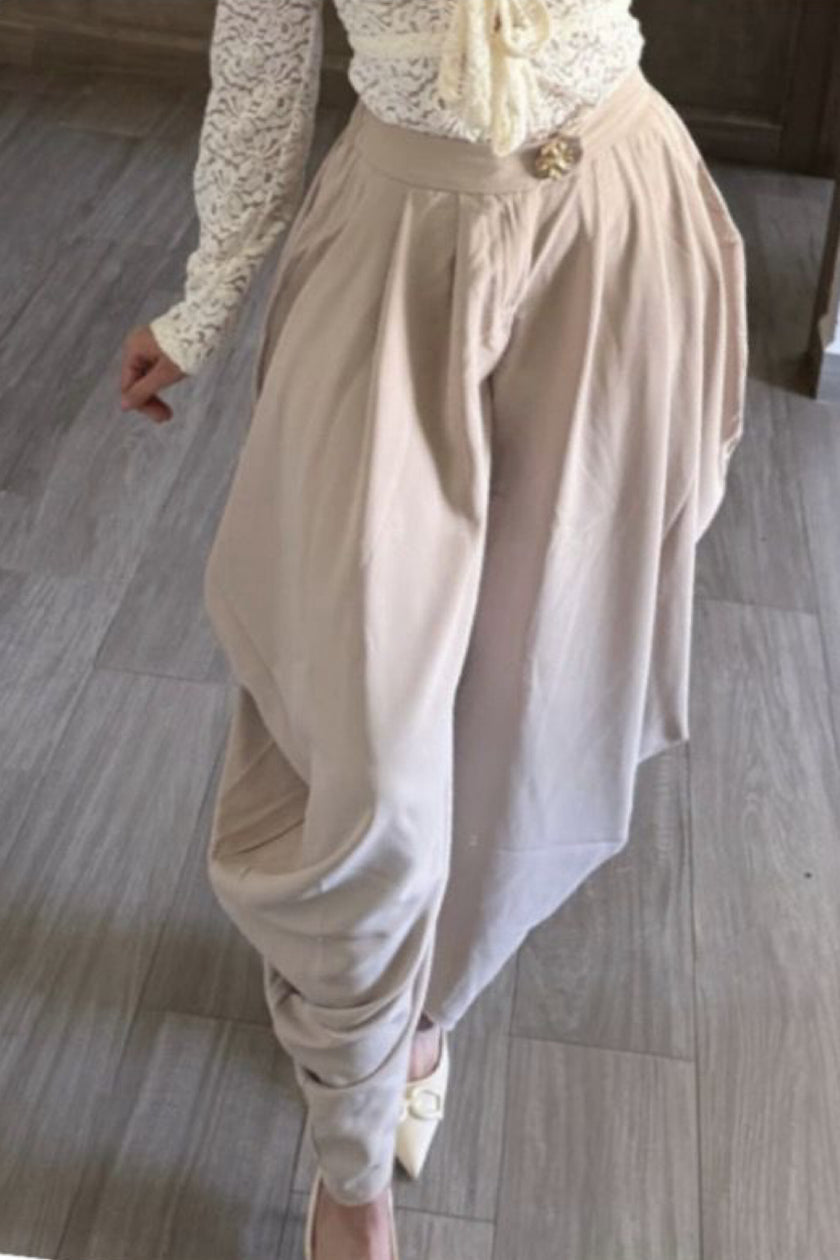 Pantalón harem beige de tiro alto vista de frente Jash Online